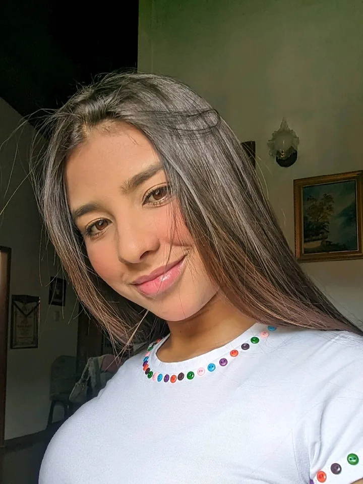 Pink Chat Live video chat screen with a smiling woman in a white T-shirt